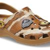 Crocs (GS) Jurassic World Classic -kengät ”Brown White” 208860-202