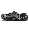 Crocs (WMNS) Smiley World Classic -kengät ”Black White Yellow” 873137